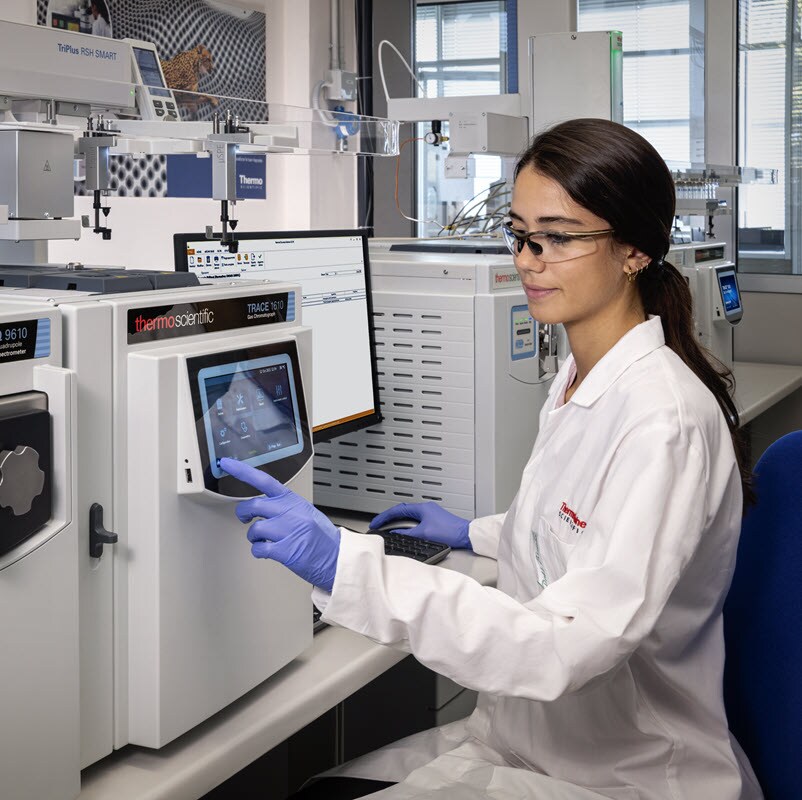 Laboratory worker uses gas chromatography instrument