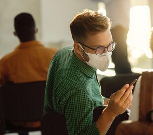 Image: College student wearing a mask