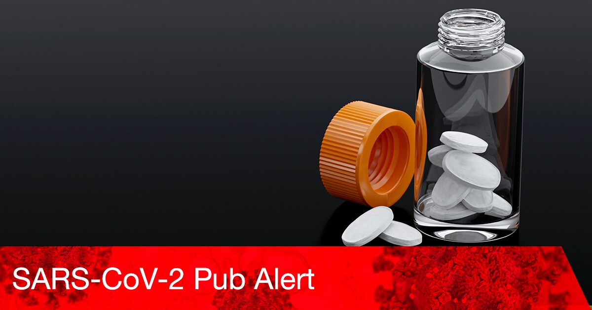 A glass bottle of white pills in front of a dark background, representing drug repurposing for SARS-CoV-2