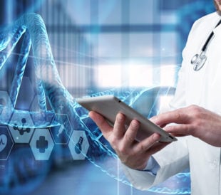 scientist typing on tablet