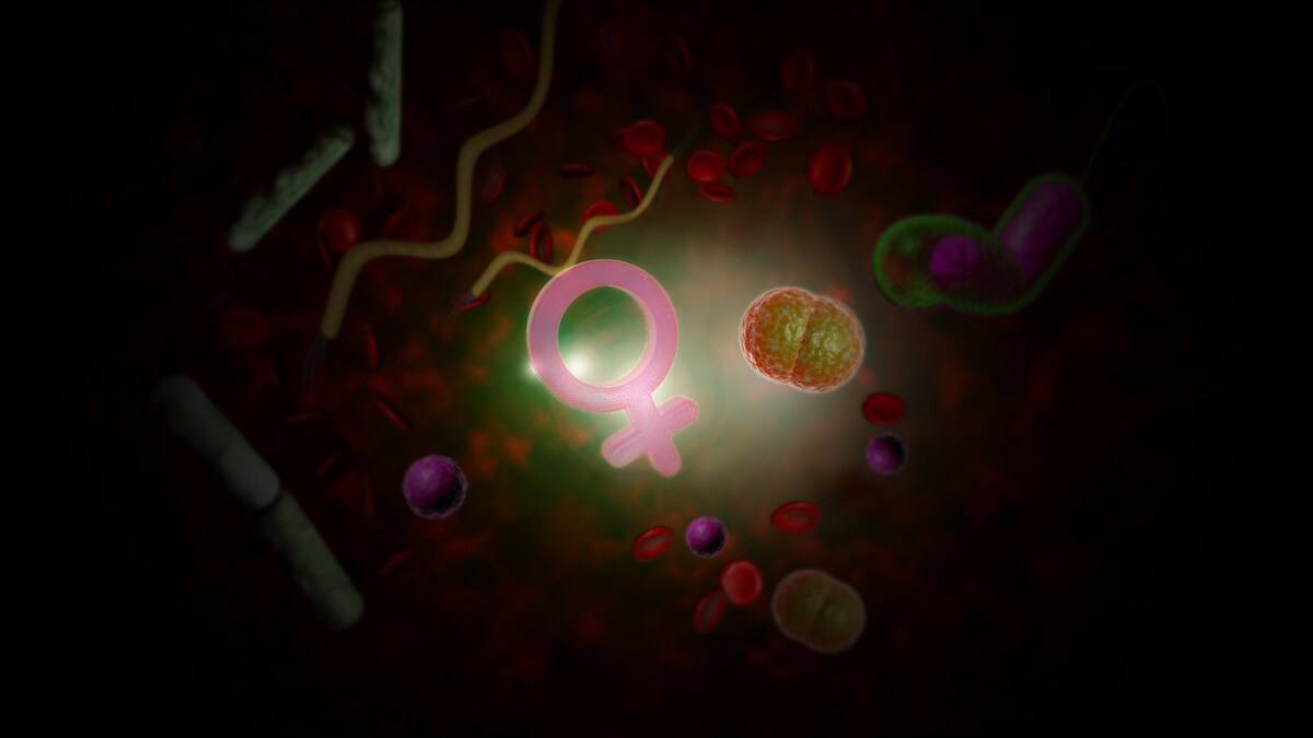 A graphic shows bacteria and a female symbol