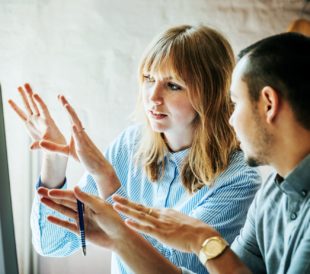 colleagues at computer together exploring possibilities