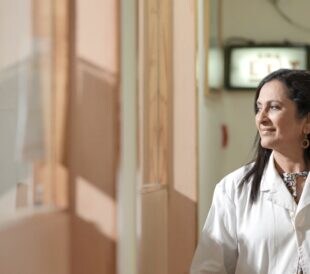 Dr. Chougule walks through her lab.