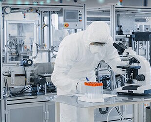 pharma scientist in lab using spectroscopy