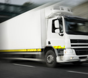 Refrigerated truck in motion. Image: Rihardzz/Shutterstock.com