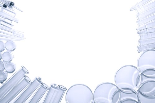 Petri dishes, test tubes and syringes on a white background. Image: Olivier Le Queinec/Shutterstock.com