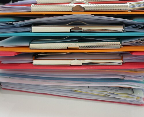 Stack of clipboards. Image: NINUN/Shutterstock.com