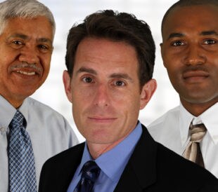 Business team of mixed races at office. Image: Rob Marmion/Shutterstock.com.