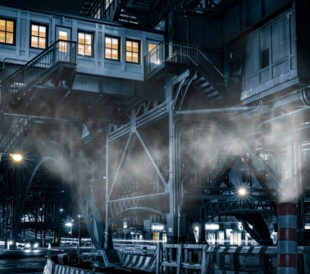 125th street commuter hub station, in Harlem, New York City rendered with a moody monochrome cinematic effect. Image: mandritoiu/Shutterstock.com.