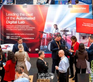 Crowd gathered at Thermo Fisher Scientific booth at SLAS 2026.