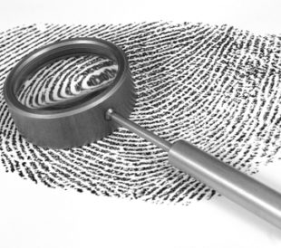 Fingerprint picture with magnifying glass - almost a biomarker...