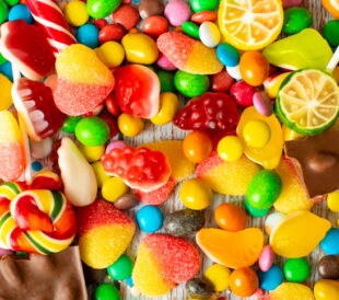 candy colored set. Multicolored candy and lollipops on a white background.