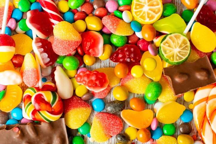 candy colored set. Multicolored candy and lollipops on a white background.