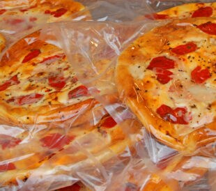craft delicious pizzas packaged for sale at the market of southern Italy