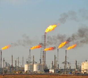 Gas flaring at an oil refinery.
