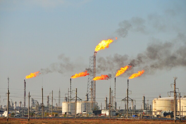 Gas flaring at an oil refinery.