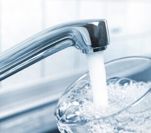 A glass of clear water from the kitchen tap