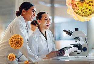 Two Female Scientists Laughing in the Lab