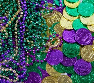 Mardi Gras beads and doubloons
