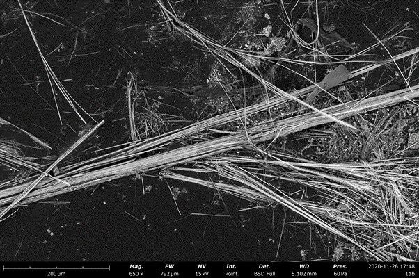 Asbestos testing with Desktop SEM imaged this bulk crocidolite asbestos