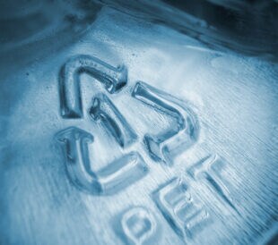 Close-up of plastic recycling symbol number 1 PET