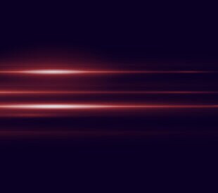 Abstract red light glare effect on a dark background.