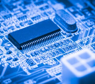 Close up of Electronic Circuits in Technology on Mainboard computer background
