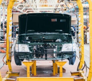Workers in an automoble factory in Beijing,China.