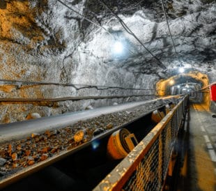 ore transported on mining conveyor