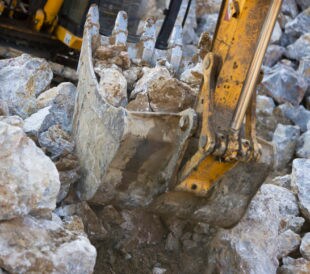 Bulldozer at stone quarry