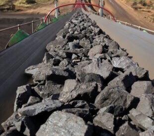A igh angle shot of a ramp for rocks on a manganese mining site in South Africa