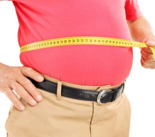 Man measuring his waist