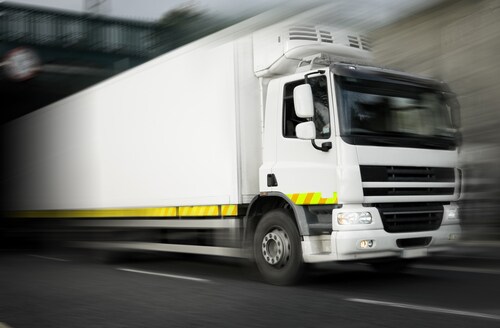 Refrigerated truck in motion. Image: Rihardzz/Shutterstock.com