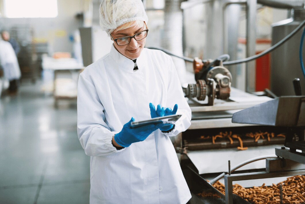 Quality control professional checks quality in food plant