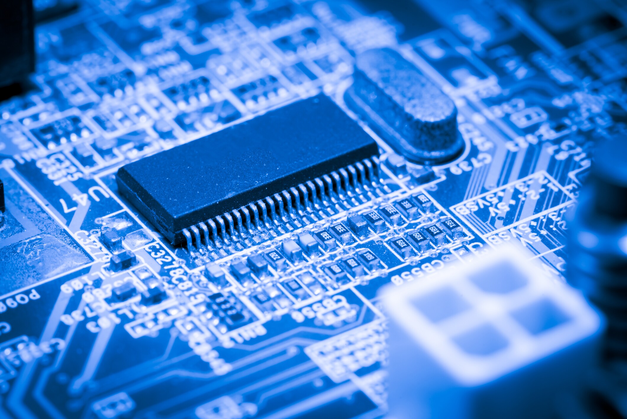 Close up of Electronic Circuits in Technology on Mainboard computer background