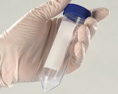 Nunc 50mL conical centrifuge tube A white gloved hand on white background holding a conical bottomed 50mL tube