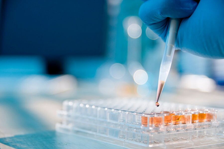 researcher pipetting into a well plate Planning ahead and suggesting the right technologies for your experiments can avoid errors