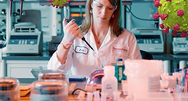 Molecular PCR testing Scientist performing molecular PCR testing in a laboratory