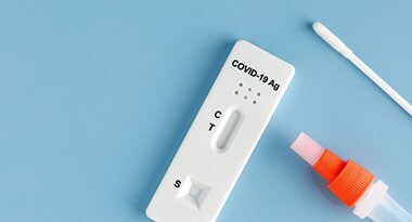 Rapid antigen test An image of a COVID-19 rapid antigen test and nasal swab