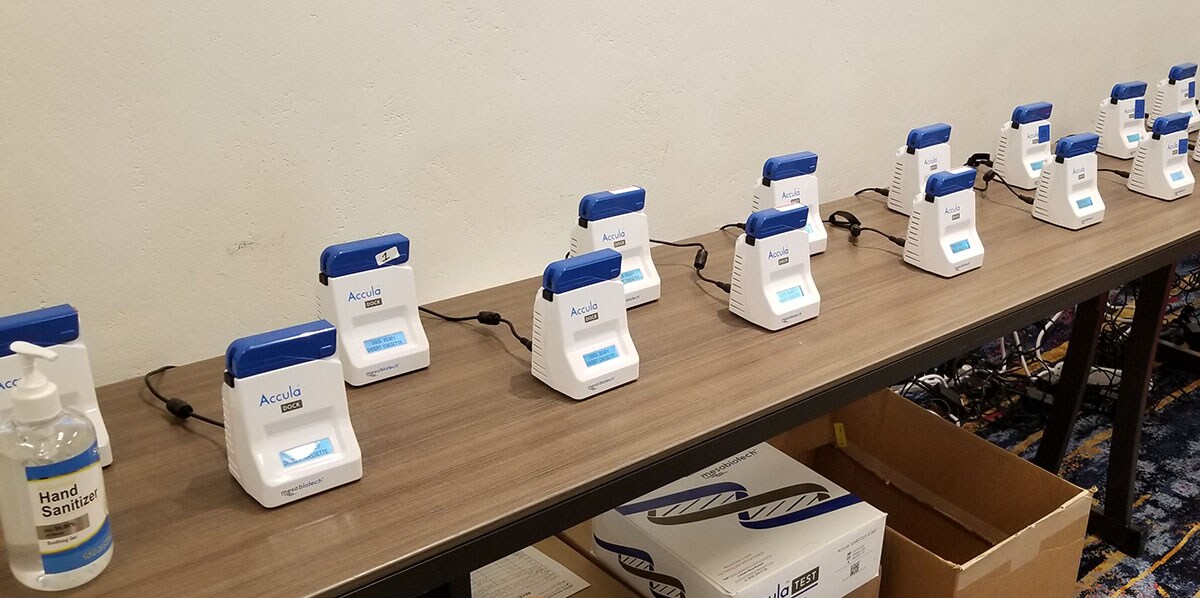 Accula Docks Rapid PCR testing docks lined up at event for onsite testing to prevent the spread of COVID-19 to protect attendee safety.
