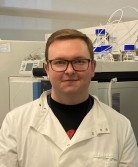 Stephen Holmes Stephen Holmes in lab coat