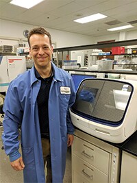 Asuragen lab scientist Image of scientist in a lab