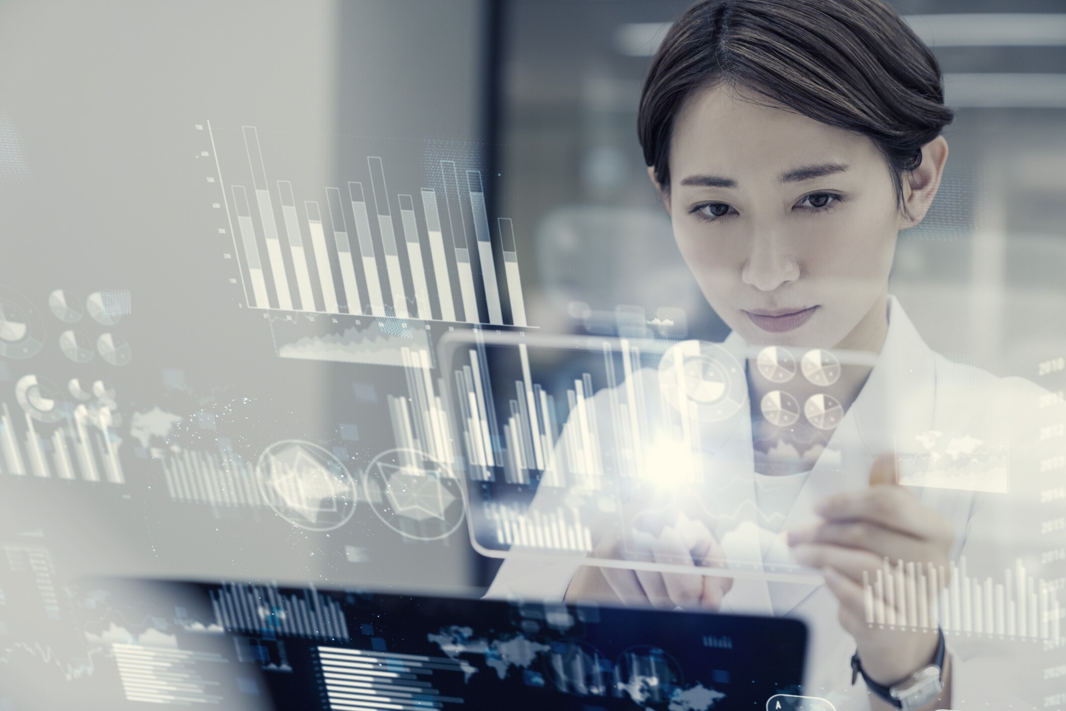 A woman accessing virtual data using an instrument A woman accessing virtual data using an instrument